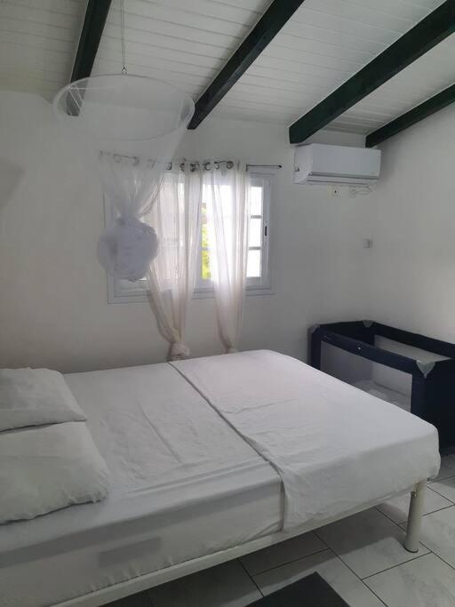 Le Sable Bleu - Evasion Tropicale A Sainte-Anne - Plage 5Min - Piscine - Parking - Logement Climatise - Vue Sur Les Palmiers - Parfait Pour Sejours En Famille Ou Entre Amis Экстерьер фото
